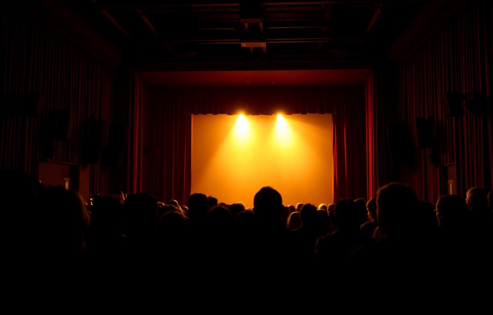 Audience watching a stage performance